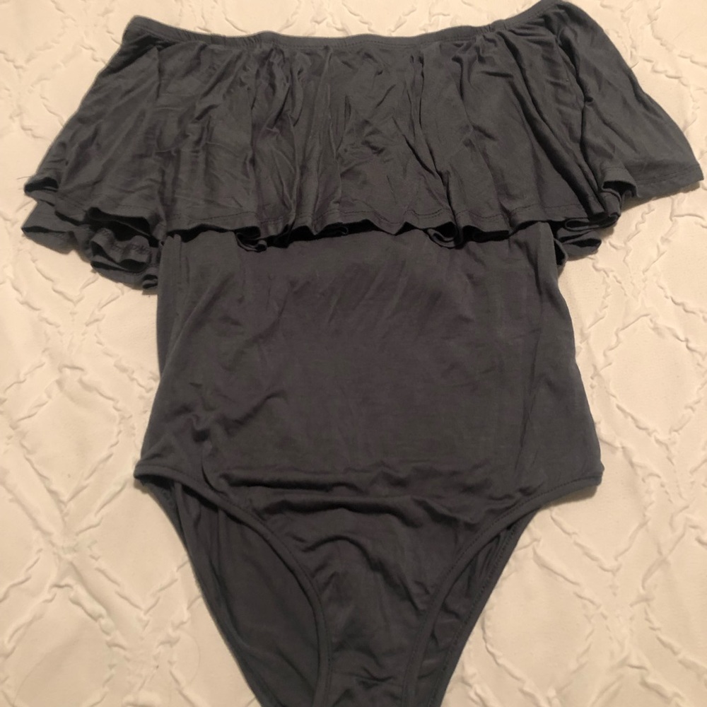Bodysuit with off shoulder ruffle. New!